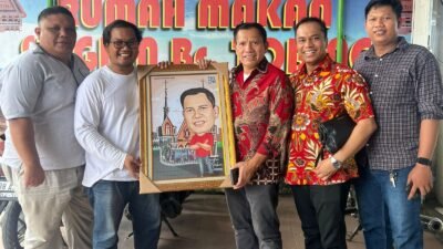 GAMKI Medan Apresiasi Landen Marbun, Hadiahkan Karikatur Paskah Nasional 2025