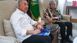 Pj Sekdaprov Sumut Terima Laporan Kinerja Komisi Informasi 2025